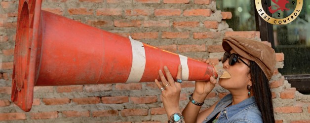 Woman using cone to shout loudly